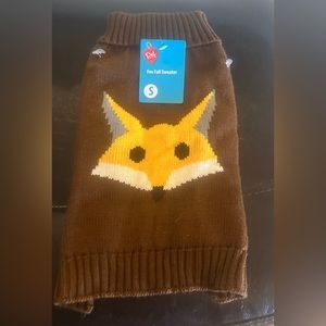 Dog sweater new with tag. Size small